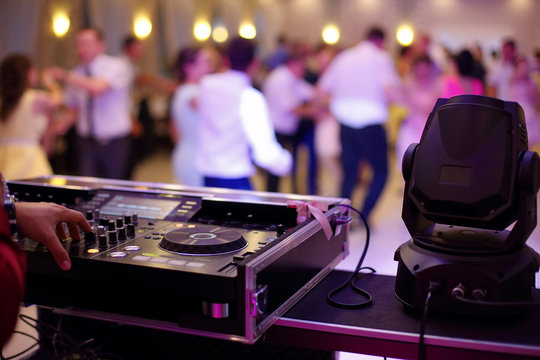 Cheerful people showered with confetti at a vibrant club party, showcasing dynamic DJ event atmosphere